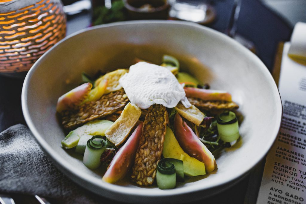 a bowl of tempeh salad
